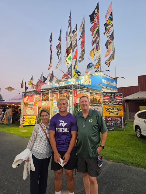 Raven with family at a Redmond community event