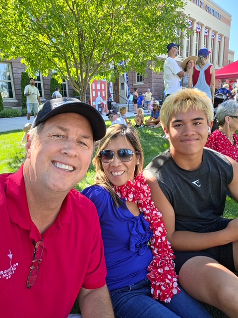 Raven with family at a Redmond community gathering